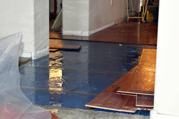 Professional Basement Flood Cleanup technician working in Clinton, OK